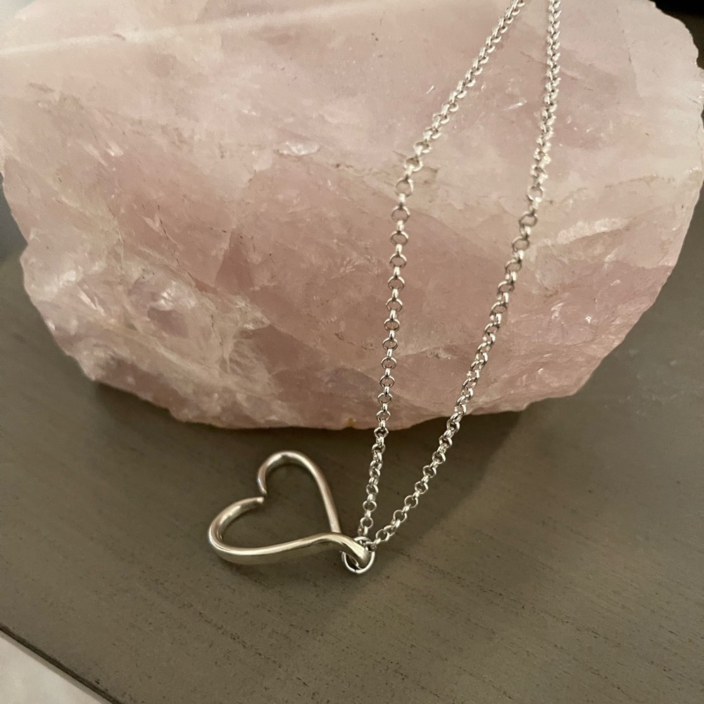 Heart pendant on silver chain.